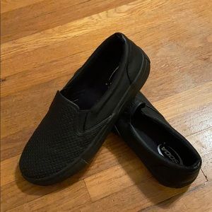 Black slip on sneakers